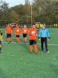 Voetbal mte een grote V en politiek met een kleine p 8